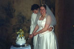 24. Tom & Charlotte cutting cake