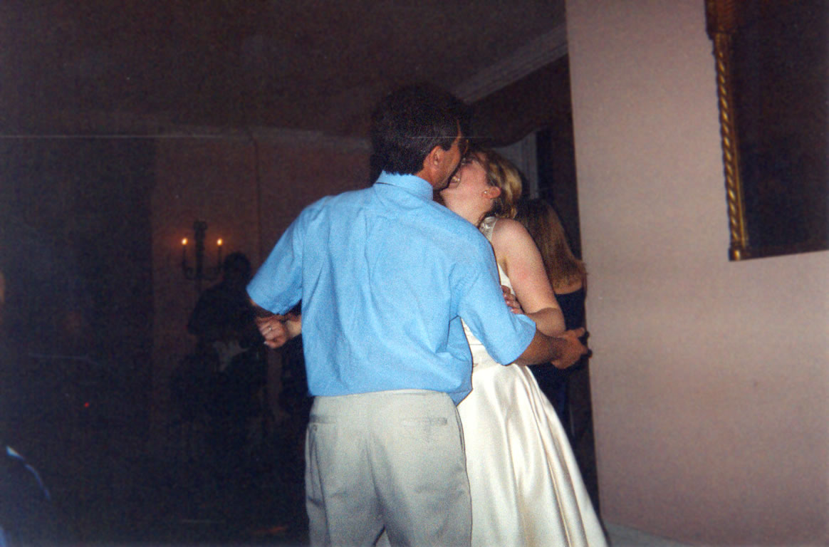 Charlotte dancing with a man who is not her husband