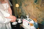 4. Tom & Charlotte pretending to cut cake